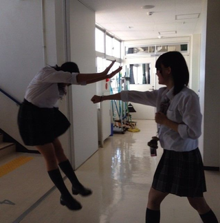 Illustration for article titled Japanese Schoolgirls Bring Manga Style Martial Arts To Life for Fun